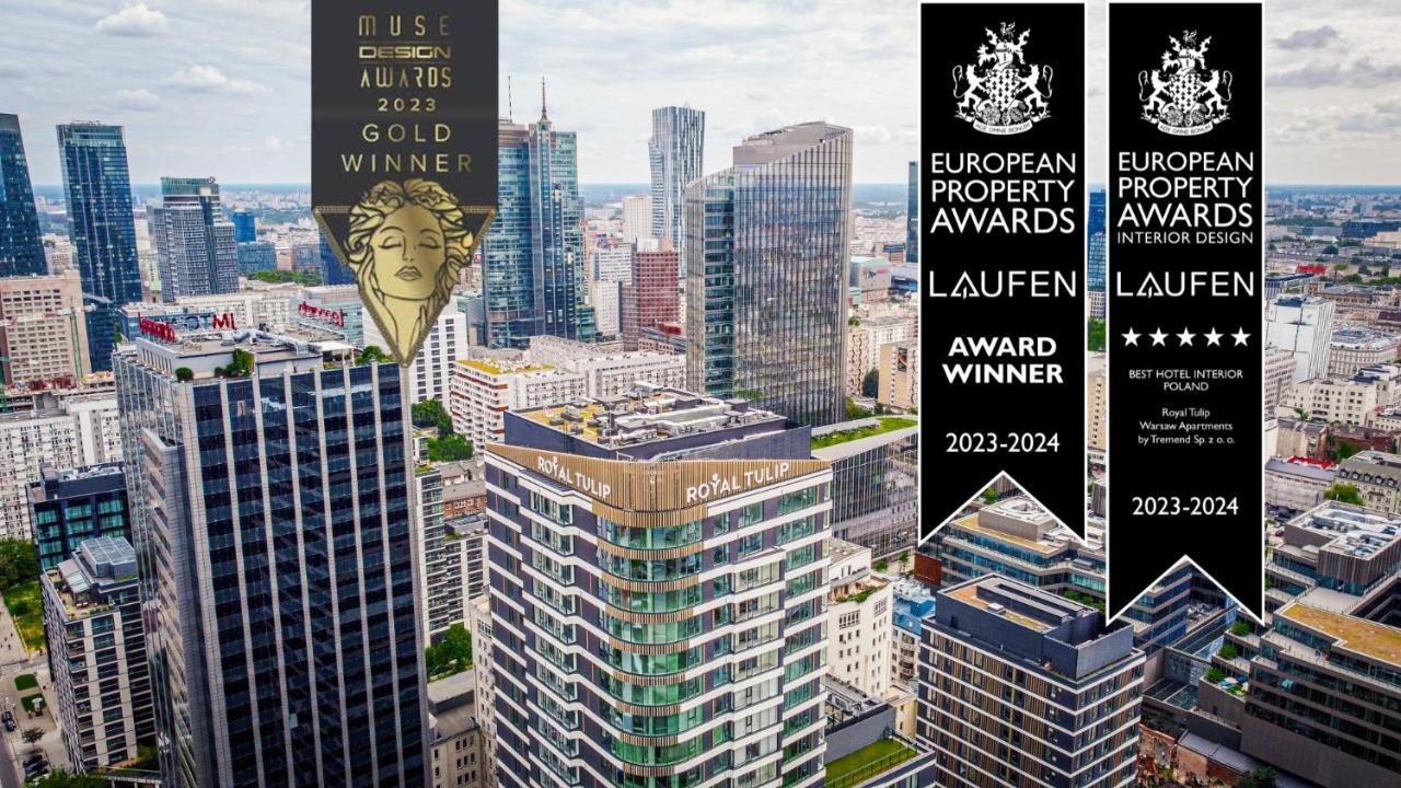 Royal Tulip Warsaw Centre Aparthotel Exterior foto The image showcases a city skyline featuring modern high-rise buildings. Prominently displayed are awards indicating recognition for excellence in design and property management. These include a gold award from the "MUSE Design Awards 2023" and a win